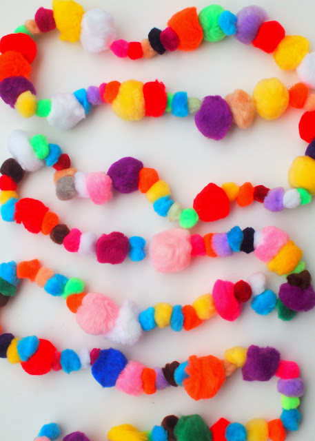 how to make a pom-pom garland- the absolute easiest craft with adorable results!  