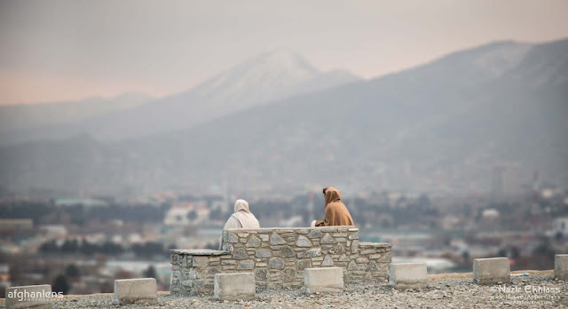 kabul afghanistan two men talking 