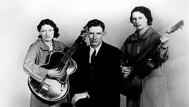 Black and white photo of the country group, the Carter Family with the three original members