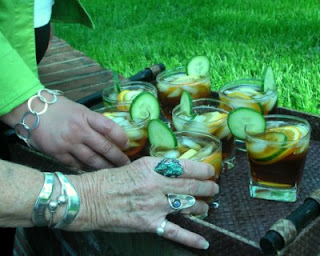 Mothers and daughters enjoying Pimm's on the patio, a refreshing summer cocktail, fresh and fruity