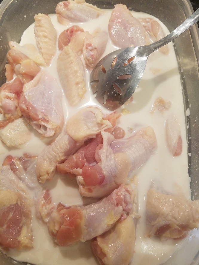 these are wings soaking in buttermilk