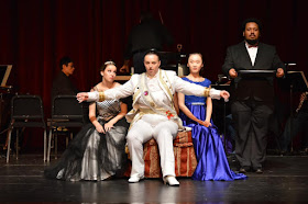 IN REVIEW: (from left to right) soprano CLAIRE GRIFFIN as Adele, mezzo-soprano BAILEY LAIL as Prinz Orlovsky, soprano MUJUN XIE as Ida, and bass RAFAEL ALEJANDRO GARCIA as Ivan in UNCG Opera Theatre's production of Johann Strauss II's DIE FLEDERMAUS [Photograph © by Amber-Rose Romero, Tamary Beliy, & UNCG Opera Theatre]