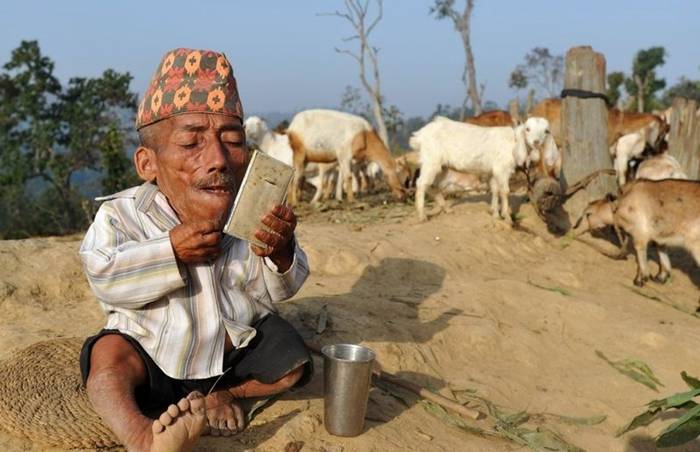 The Shortest adult human ever recorded after measuring his height three times in 24 hours. The chief editor of Guinness Book of World Records said that Chandra is the only person in Guinness' 57 years history to record the title of the shortest man at the age of 73.