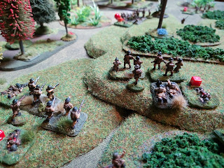 The Australians move forward to fire on the second Japanese section