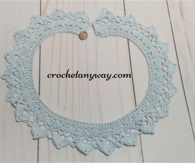 finished crochet collar with button in blue cotton crochet thread