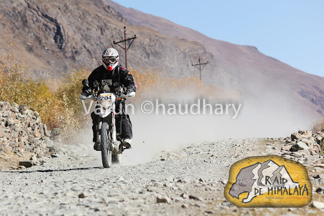 After extreme action of cars at Raid de Himalaya, it's time to have a PHOTO JOURNEY of Bikers. Usually bikes are more interesting to click as compared to cars, but in Raid everything is super exciting !!! Let's start this journey with bikes in action....This whole event is very well planned and everyone is well aware of actions to be happen during the week of Raid. I was really amazed to see the detailing of event at http://www.raid-de-himalaya.com/2011/Xtreme/supregs2w2011.pdf . I have seen documents of other motorsports in North India and most of them are really disorganized and planned very unprofessionally. The whole team of Himalayan Motorsports work really hard to make each thing very special and safe !!!Bikes are really specially for shooting and panning is one of the technique, which can't be missed during such events where bikers love to fly in air...Raid de Himalaya started from Peterhoff Hotel, Shimla and day one ended at Manali through Jalori Pass !!! Whole route was like  Shimla to Manali == Manali-Leh(via Sarchu) ==Leh-Leh(via Wari La & Khardung La) == Leh-Rangdum(via Kargil) == Rangdum-Rangdum(via Padum) == Rangdum-Srinagar(via Kargil)Himalayan Motorsports organize this wonderful event and here are some contact details -Himalayan MotorsportMotoworld, Navbahar, Shimla,Himachal Pradesh - IndiaPhone: +91 (0) 177 2842916Fax: +91 (0) 177 2844338Email: info@raid-de-himalaya.comTotal distance covered was 2200 kilometers, including 667 kilometers of competitive sections. 667 Kms were covered during 11 different competitive stages. The Moto Alpine was about running the first 3 legs of the rally and end at night haltof leg 3 at Leh. This shorter version was open to all newcomers to the Raid de HimalayaOnly those that had never participated before in the Raid (on a / Quad) are eligible tenter for the Moto Alpine.The Moto Xtreme was complete version of the Raid de Himalaya, running all 6 legs anwas open to both previous participants as well as the new entrants to the Raid, In shorwhereas a previous participant could not enter the Moto Alpine...Bikes of 100cc to 700cc participate in Raid and all of them are categorized into different classes, on the basis of their machine powers.Most of these folks used some imported bikes or modified versions of high power bikes. On top of that each biker needs to have a team to ensure that any break-down on the way can be fixed as quick as possible.Another special thing about these motorsport rallies is their route. Most difficult terrain are chosen with appropriate safely measures in mind. In fact, security planning takes various months to finalize things with Government and private agencies. All riders in Raid are really disciplined about safely as well. Following passion with proper safely measures is also very important.Raid de Himalaya rally passes through various villages in Himachal Pradesh and Jammu & Kashmir !!!Riding on such a road is a real luxury. At various points it's difficult to find the road on rough hills with landslides and water streams around !!! Riding bike in Raid is really difficult as riders have no option of driving the vehicles by sitting on closed cabins. Weather is another challenge for bike riders in Raid de HimalayaSome information picked from official Facebook page of RAID DE HIMALAYA Raid de Himalaya is among the most extreme motor sport events organized at an international level. It runs on the highest altitudes as compared to others including the Paris Dakar Rally. http://www.raid-de-himalaya.com/Mountains and Bikes seem to be made to be seen together. Several Indian travellers have now started taking on the mountains on their bikes. The main reason is the same as the the bikers participating in the rally - the thrill of scaling these heights.Navigating the curves, dodging the rocks, and leaving a dust trail, the riders manoever their mean machines faultlessly and spectators can't do much but stare at them with awe.They look the same at a glance, but all riders have their own unique techniques that only experts can detect.Amongst the barren, brown hills the only streaks of colour are these motorbikes. For the duration of the rally, the region comes alive with these dashing, roaring machines.In spite of the tiring route that not only makes you push the boundaries of your schools, each biker starts longing to return for another ride, another adventure soon after one is over.Rearing and roaring like a wild beast, these bikes are merely pets in their riders' hands, obeying each command, following each direction to the last letter.Once the race is over and the bikers have left, the hills lie forlorn, full of longing for these noisy destructive forces of technology to come and make them come alive again.The heights seem scalable and the terrain no longer a foe, when you are flying on your machine. No wonder each biker comes back year after year to scale these heights till they become as familiar to them as the back of their hands. 