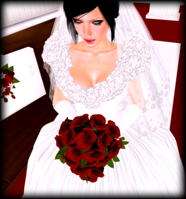 The Dark Red Rose Bridal Bouquet is from Weddings By Nienna