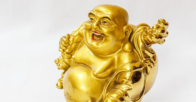 Types of Laughing Buddha and their Meaning