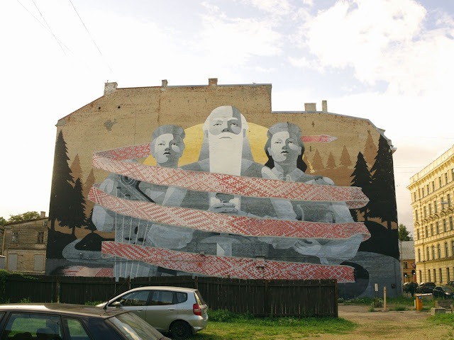the largest mural in the Baltic states depicting the "Sun, Thunder, Daugava" song