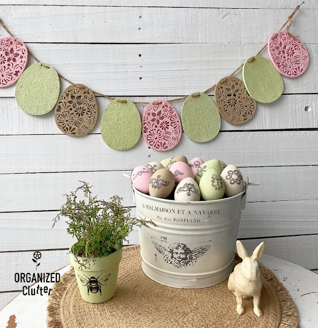 Photo of a Hobby Lobby Felt Easter Egg Banner painted with Dixie Belle Chalk paint.
