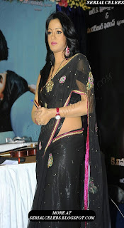 Udaya Bhanu in black low hip saree