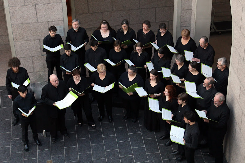 Rae sings at The National Gallery for her first Stairwell Carollers Concert