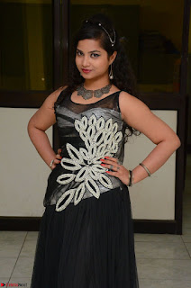 Shrisha Dasari in Sleeveless Short Black Dress At Follow Follow U Audio Launch 014.JPG