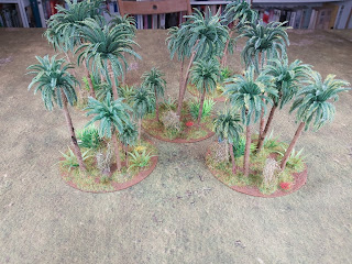 CDs form the bases for these jungle terrain pieces
