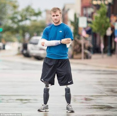 http://www.dailymail.co.uk/news/article-2729920/Touching-photo-shows-heartwarming-moment-humble-airport-mechanic-helps-quadruple-amputee-war-veteran-fix-broken-leg.html