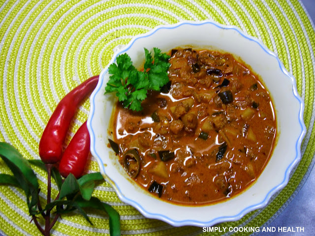 Prawn gravy with spices and coconut milk