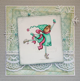 Snowy winter card with tiny skater girl (image from Stamping Bella)