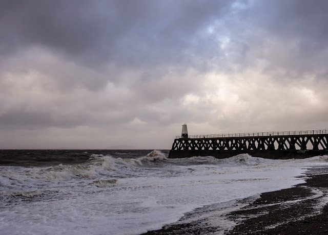 Photo of stormy skies over Maryport's south pier