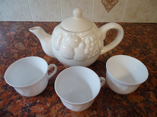 The Teapot and Cups For An English Afternoon Tea