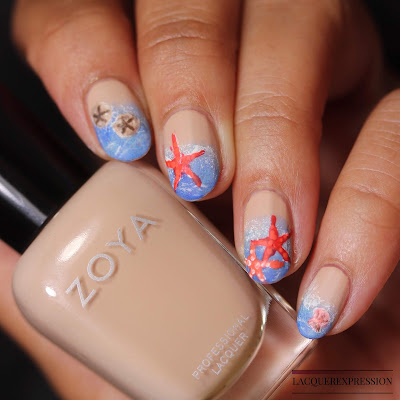 Free-handed hand painted summer beach nail art using nail polish