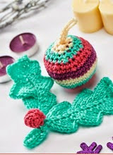 http://www.letsknit.co.uk/free-knitting-patterns/christmas-decorations