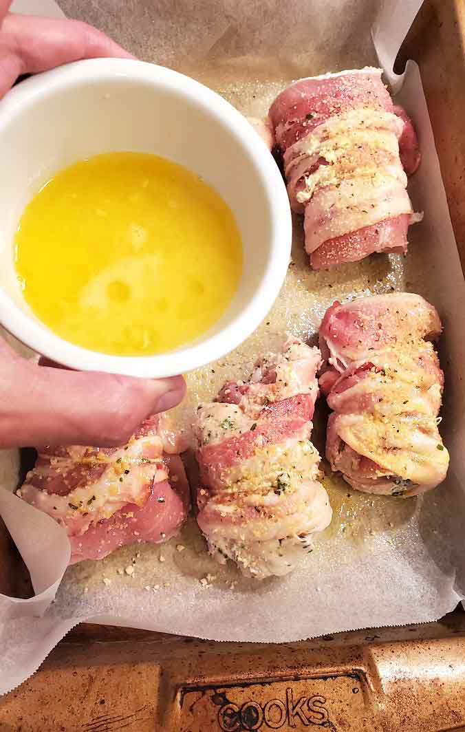 this is butter being poured over pork tenderloin