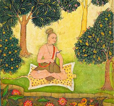 Yogi doing meditation under tree