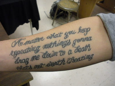 Elliott Smith lyric tattoo on Alden F.'s forearm. 17 December 2008.