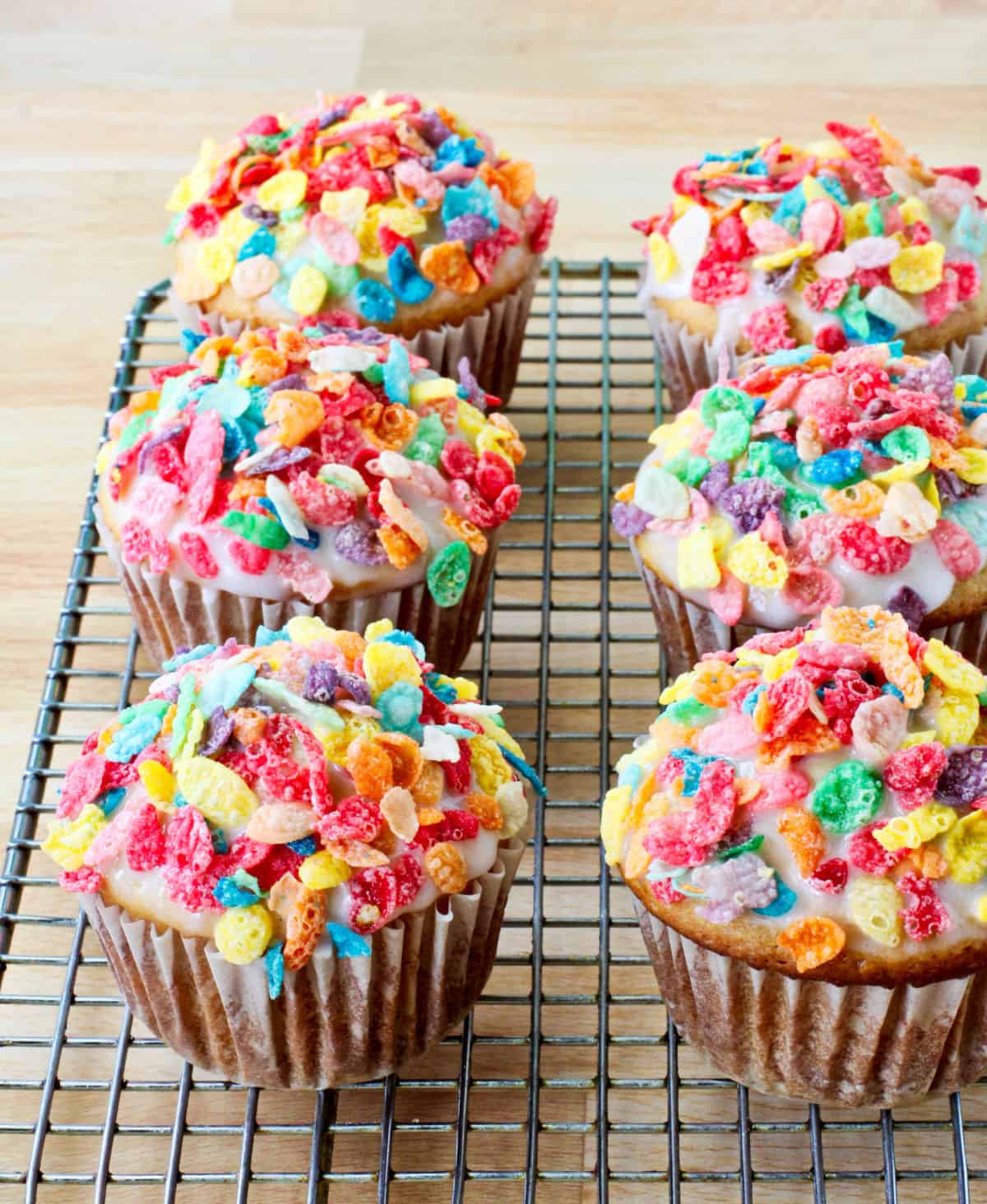 Cereal Milk Muffins on a cooling rack.