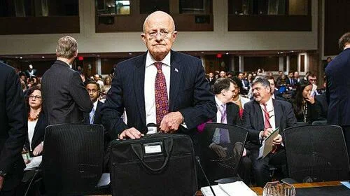 Former Director of National Intelligence James Clapper arrives on Capitol Hill to testify before the Senate Armed Services Committee on Jan. 5