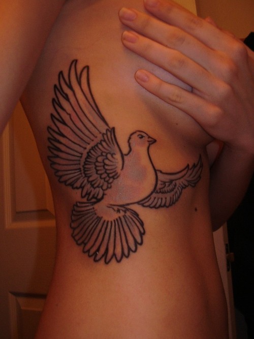 tattoos of doves. tattoos of doves.