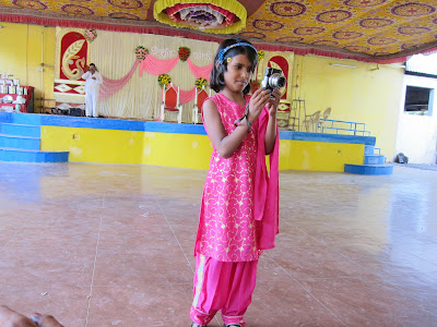 Indian wedding child with camera