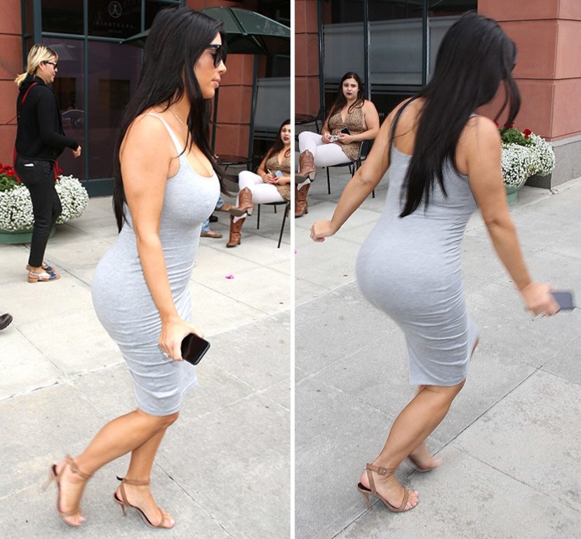 Kim Kardashian steps out in heels as pregnancy is starting to make 