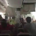 Picture the terrifying moment 300 passengers flee Emirates plane moments before it burst into flames after crash landing in Dubai.