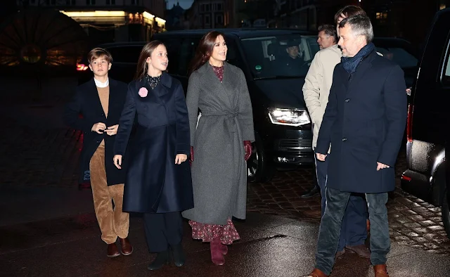 Crown Princess Mary wore an akina wine Jacqui B dress by Saloni. Princess Isabella in Hugo Boss Cetiva coat. Princess Marie