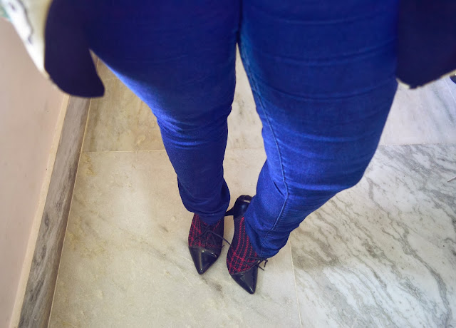 blue jeggings and plaid boots