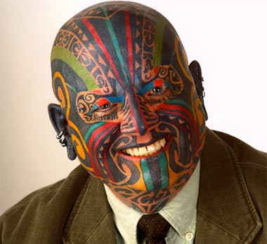 Colorful face tattoo.