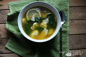 A bowl of refreshing gluten free tortellini broth on Anyonita Nibbles