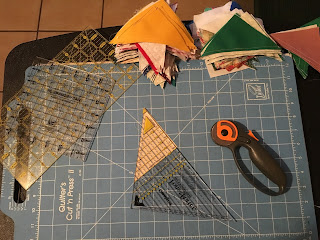 Quilting tools and cut fabric