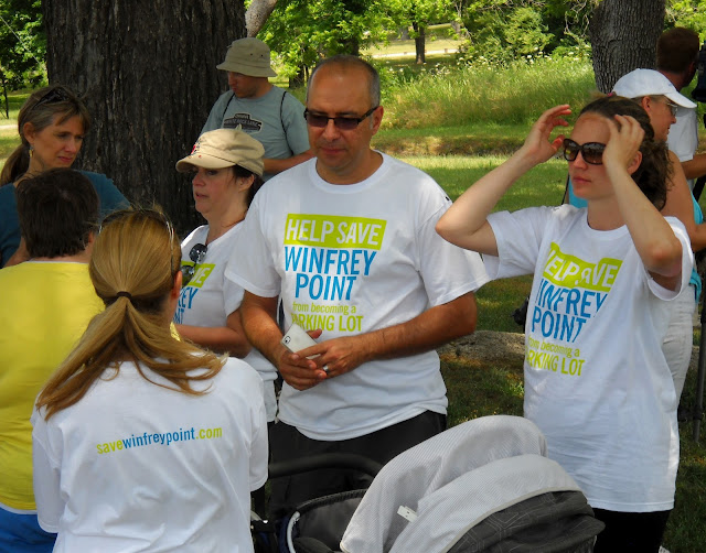 Supporters of Save Winfrey Point gather to protest at White Rock Lake, Dallas