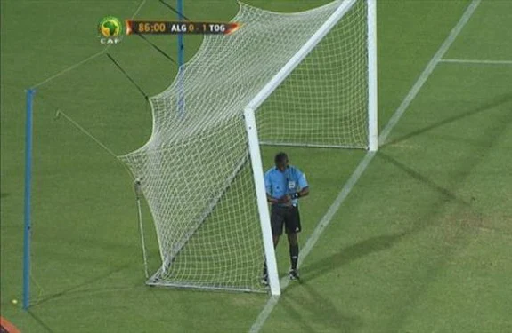 A near collapse of the goalpost on the Togo end of the field forced the referee to halt the game