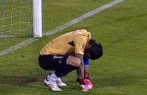 Red Star goalkeeper Boban Bajković reacts after conceding a bizarre goal against Jagodina