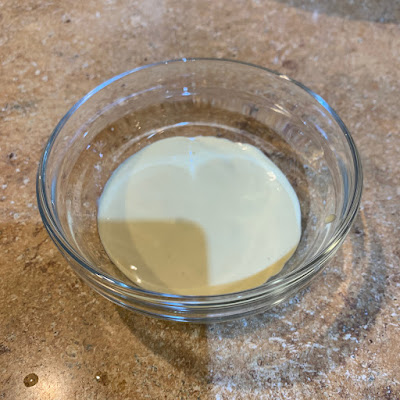 bowl of salad dressing