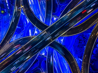 Aerial view of a neon highway intersection