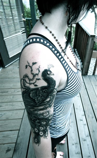 One of the most eyepleasing of all bird tattoos is the peacock tattoo