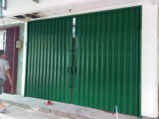 sale servis aneka pintu  garasi  folding gate rolling door 