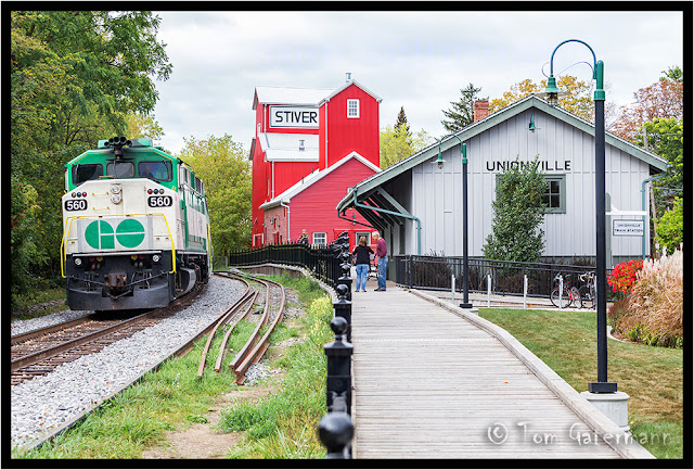 GO Transit 560 passes Stiver Mill at the old Unionville depot, in Markham, ON.