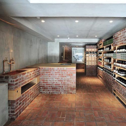 Traditional Chemical Store Design with Unfinished Brick Interior