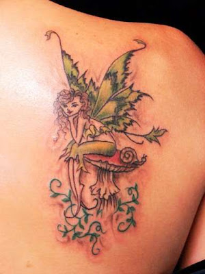 fairy tattoo on back are popular with girls and women because of it cutesy