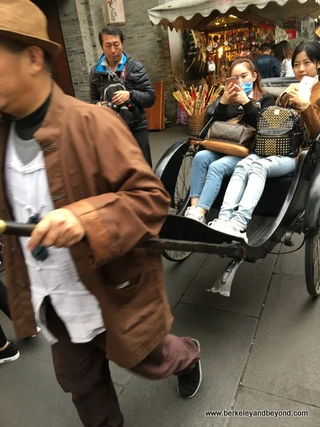 rickshaw ride on Jinli Old Street in Chengdu, China